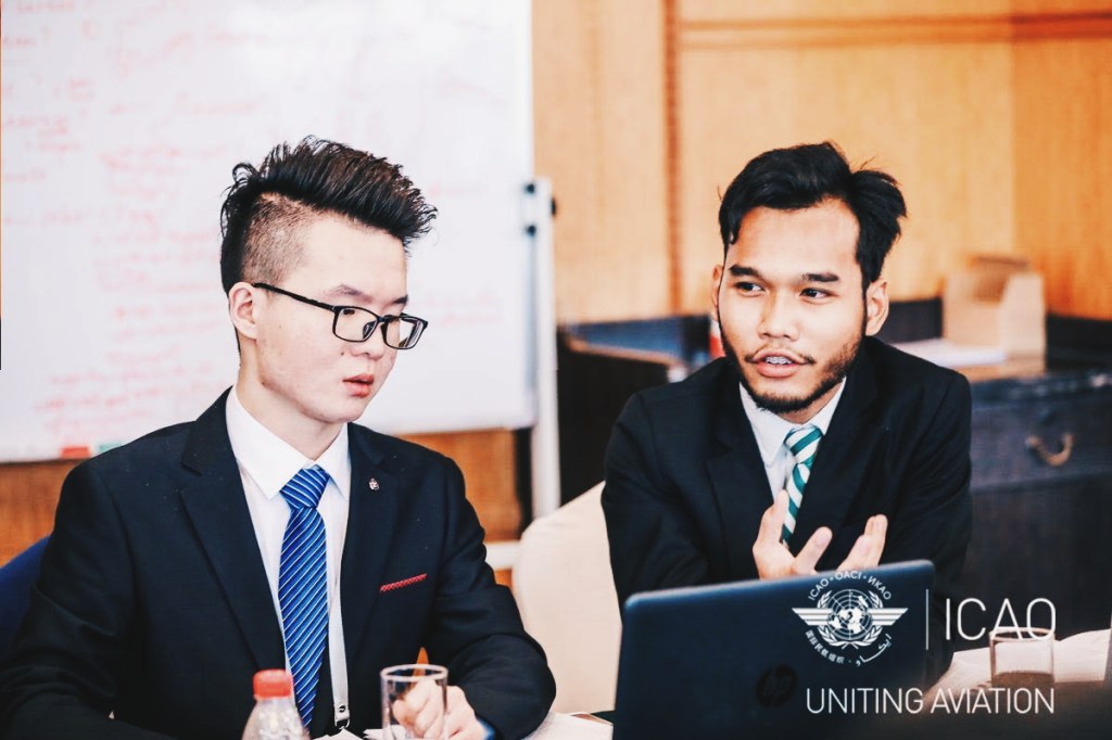 Danish Danial Bin Anuar engaged in a discussion at the 2nd Model ICAO Forum